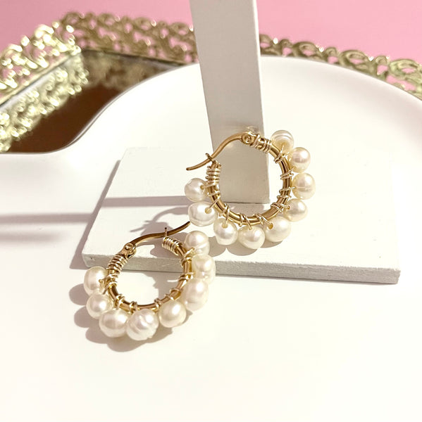 Aretes Perla de río.