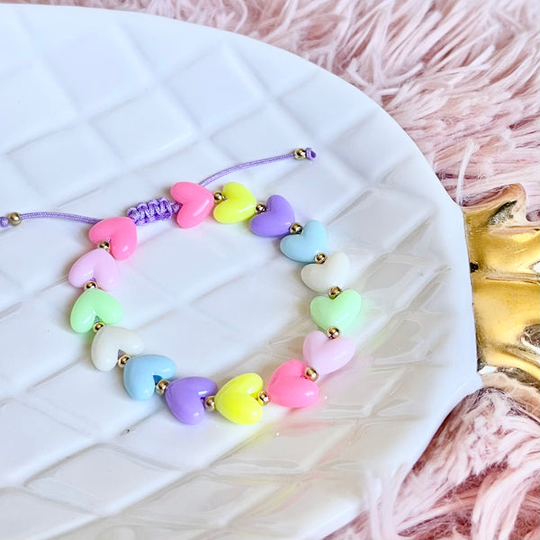Pulsera corazón pastel.