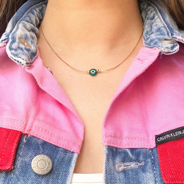 Collar ojo turco.